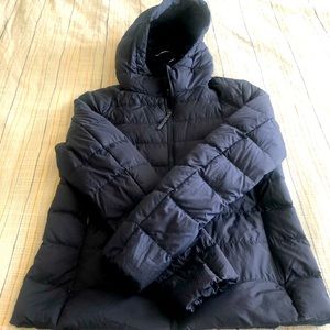 Uniqlo’s Ultra Light Down Jacket in Navy - Size S. In excellent condition.